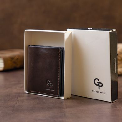 Вертикальне глянсове портмоне з накладною монетницьою GRANDE PELLE 11330 Шоколадне